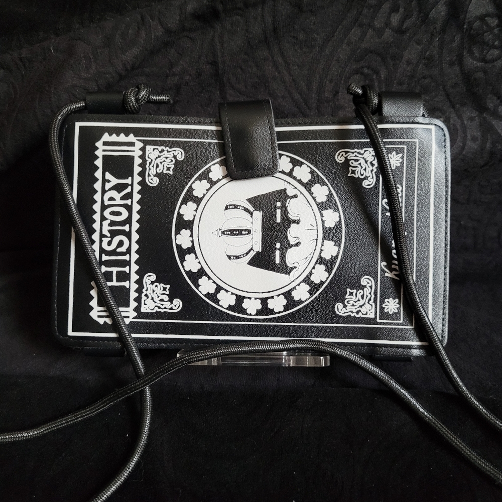 Book clutch with phone pocket